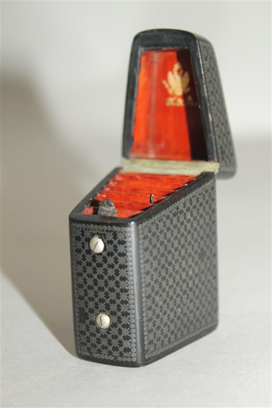 A late 19th century Russian black lacquered and pewter inlaid needle case, 2.25in.